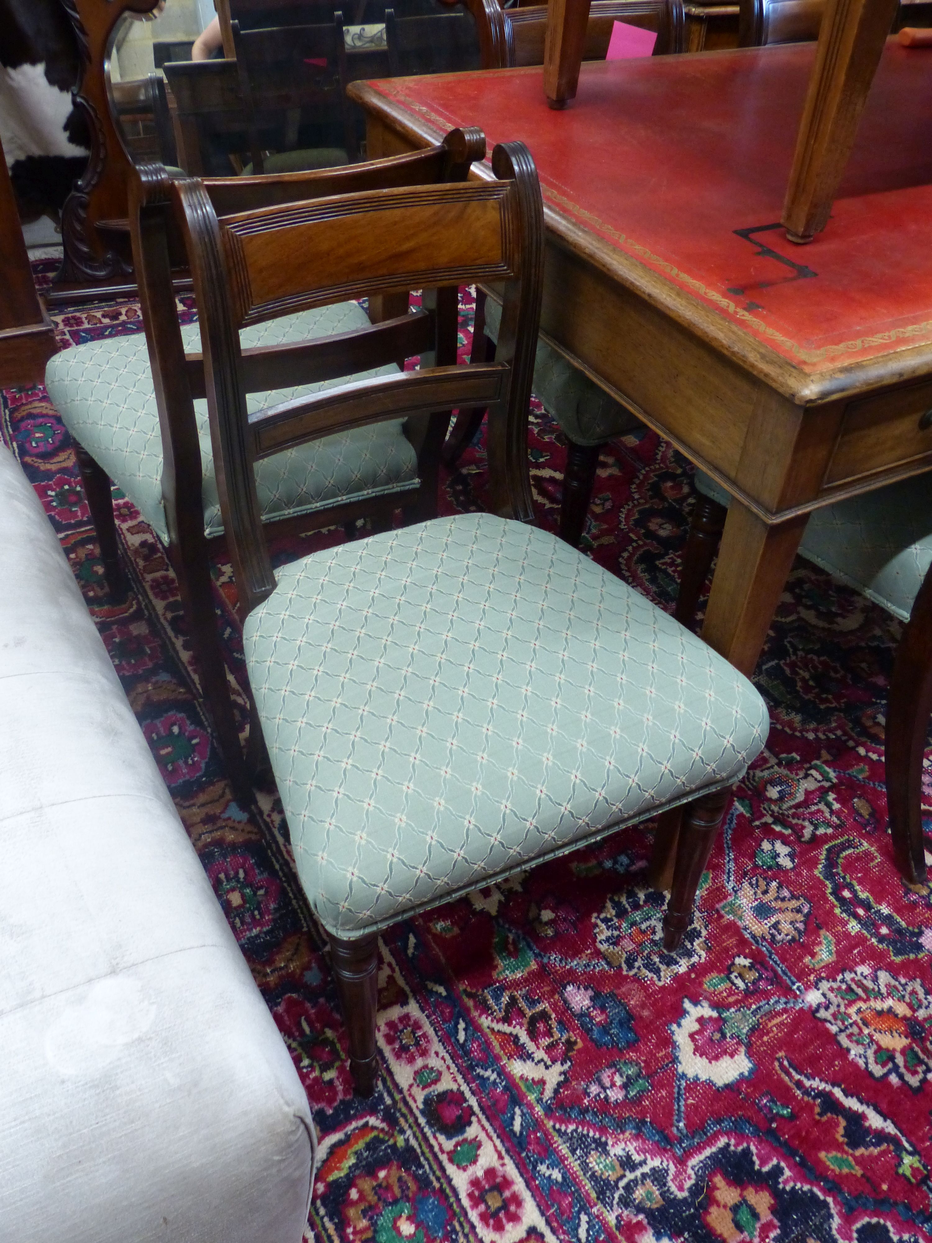 A set of six Regency mahogany dining chairs